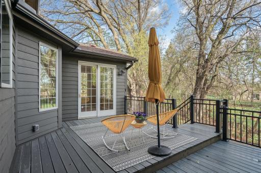 The deck off the sun room has low-maintenance composite decking.