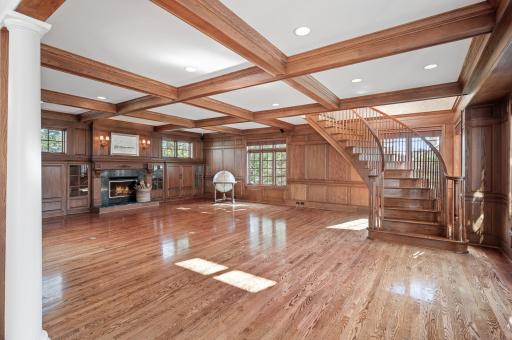 The gorgeous Great Room with its custom panelling, gleaming floors and coffered ceiling.