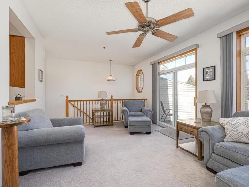 The living room stays bright with S.E. exposure. The carpeting throughout this townhome was new in 2018 and cleaned in January 2024.