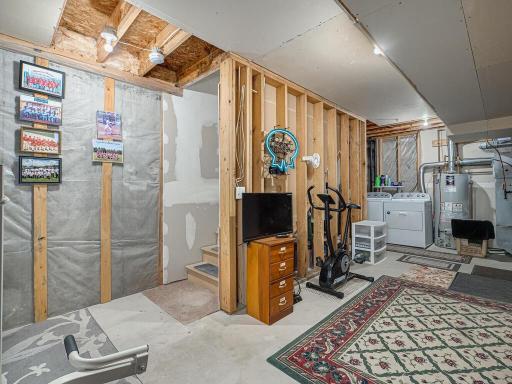 The unfinished basement contains the laundry and mechanical area and offers an abundance of uses--workout area--extra storage and more--also opens directly to the garage. The washer, dryer and water heater-new in 2019 and the central air new in 2020.