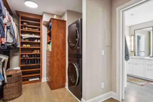 Primary walk in closet with new full size washer & dryer