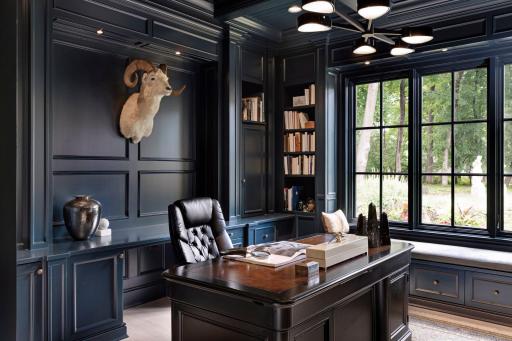 Gorgeous paneled walls, stunning color, custom fixtures and pure comfort when you step into this space.