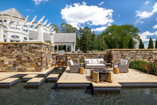 The Infinity Pool creates another outdoor room and the experience is breath-taking with stepping stones leading to a sitting area where you can reflect by a fire.