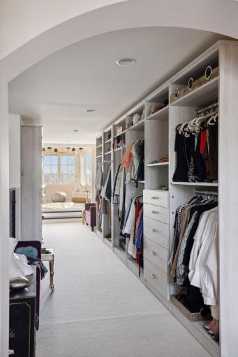 The sellers have fully designed this dressing room with custom closets.