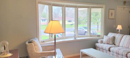New bow window makes this living room very pleasant and cheerful.