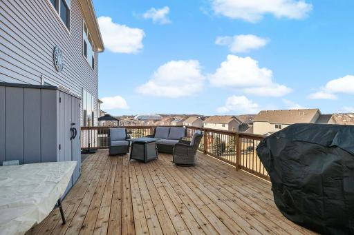 Views from spacious main level deck and storage shed. 1 of 3 conveniently located storage sheds that stay with the property.