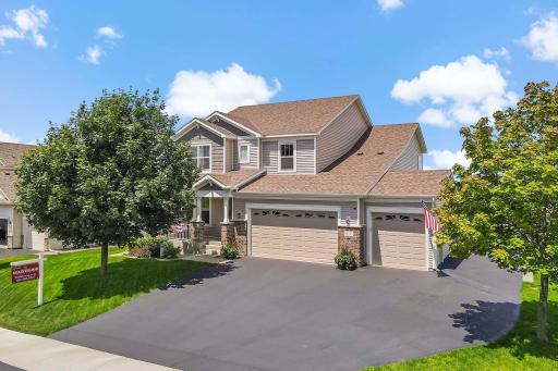 Four car garage with extra outside parking area would come in handy for teenagers or trailers.