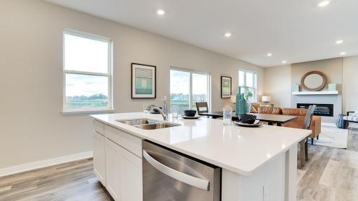 Fantastic flow in this open concept plan! *Photo is of a model home, colors may vary in actual home.