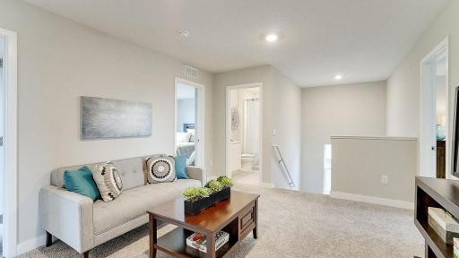 Lots of separation between the bedrooms! *Photo is of a model home, colors may vary in actual home.
