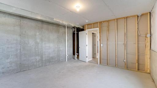Unfinished basement space. This is not the subject property.