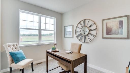 This flex space at the front of the house is a great spot for an office, but there are so many options! *Photo is of a model home, colors may vary in actual home.