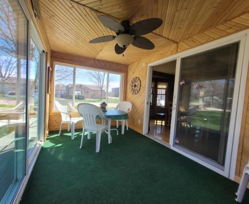 3 season sunroom accented with pine walls & ceiling