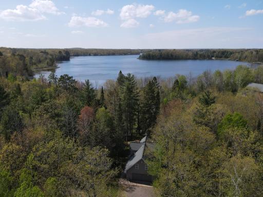 Welcome to your new lake home on 9.63 acres nestled on the shores of Iron Lake!