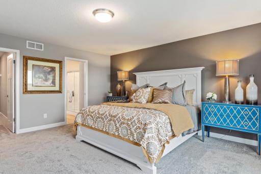 (*Photo of decorated model, actual homes colors and finishes will vary) Find your retreat in this stunning owner’s suite. Enjoy the exclusivity of a private bath and huge walk-in closet.