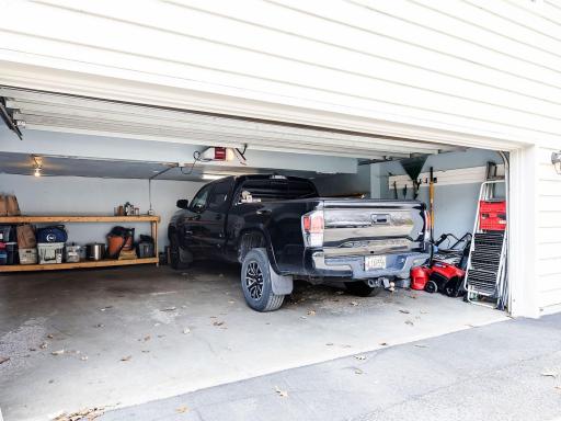 Oversized 2 car garage. Room enough for a truck and large SUV side x side + storage!