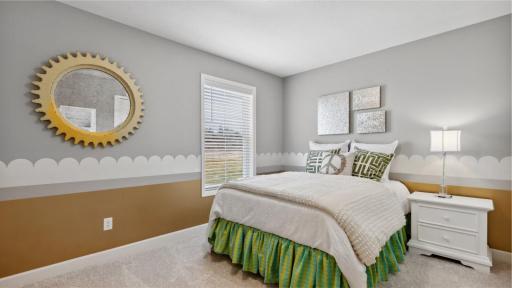 (Photo of model, actual homes finishes will vary) The largest of the secondary bedrooms, this retreat is ideal for residents who require more personal space and privacy.