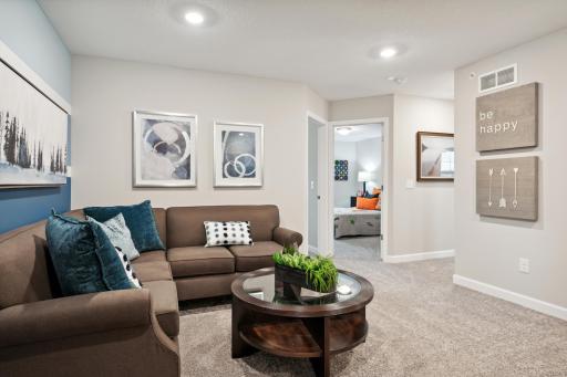 The upper level loft provides additional square feet of living space and is conveniently located adjacent to all three of the bedrooms. (*Photos are of decorated model, colors and finishes may vary.)