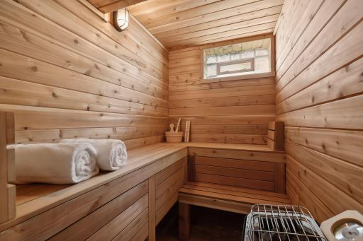 Unwind in the custom cedar sauna with glass block window. Heats up quickly!