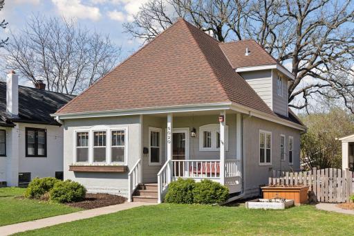 Charming Fulton bungalow with inviting front porch and curb appeal for days.