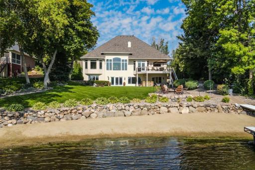 Experience the best of lakefront and golf course living at 876 Stonebrooke Drive!