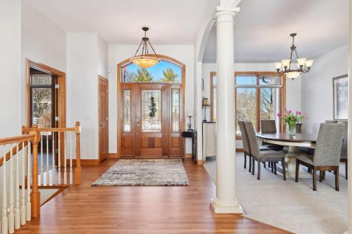 You are welcomed to the bright, south-facing entryway with newly refinished cherry hardwood flooring.