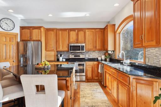 Stainless steel appliances as well as updated backsplash.