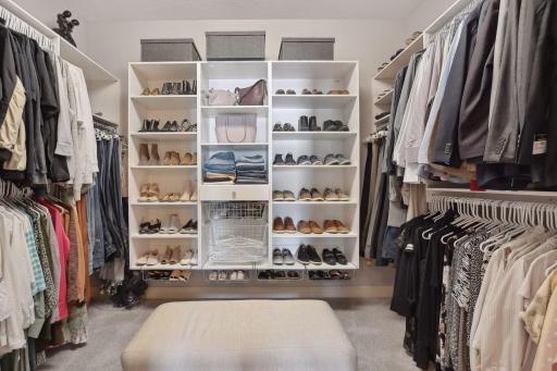 Step into your sizable closet complete with wall to wall closet organizers!