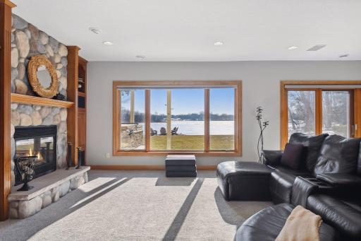 Large picture window and oversized patio door provide a bright and sunny lower level along with endless lake views.