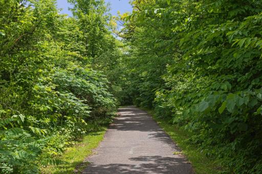 Wooded walking paths around the golf course and lake, accessible from your front door!