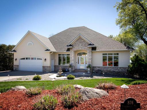 Nestled in a sought-after golf course neighborhood, this lakefront home offers an unparalleled lifestyle.