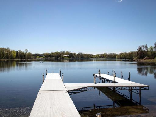 Nestled in a sought-after golf course neighborhood, this lakefront home offers an unparalleled lifestyle.