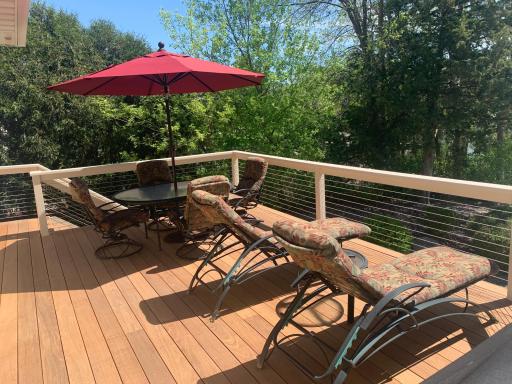 The kitchen sliding glass door leads to a large deck overlooking the lake.