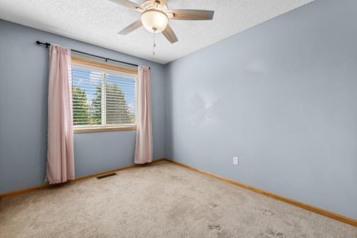 Another upper level bedroom.