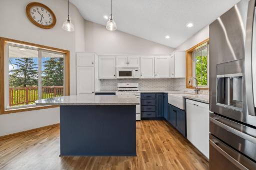 The kitchen includes: Center Island with room for seating, farmhouse sink, and all appliances are included.