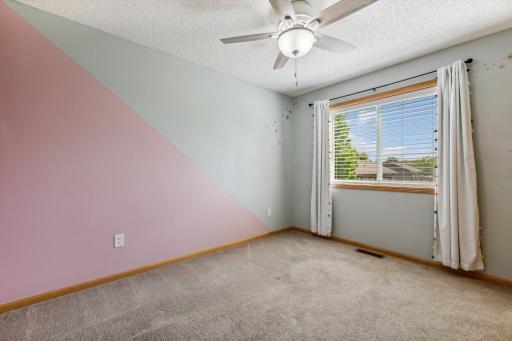 One of the three upper level bedrooms.