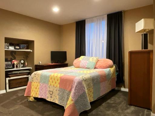 Upper Level 2nd Bedroom with spacious walk in closet!
