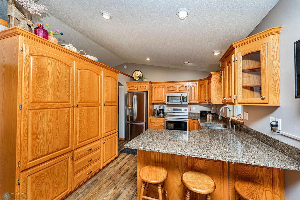 Beautiful Woodwork in the Kitchen. Lots of Added Cabinets