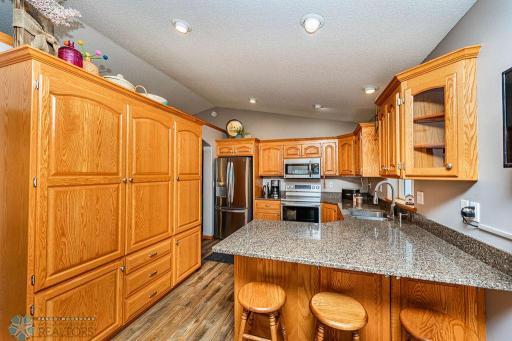 Beautiful Woodwork in the Kitchen. Lots of Added Cabinets