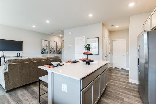 The Fairmont's kitchen offers a spacious center island for your entertaining and culinary needs. It is both functional and beautiful with the luxurious quartz countertops! *Photo is of model home, colors and selections shown may vary.