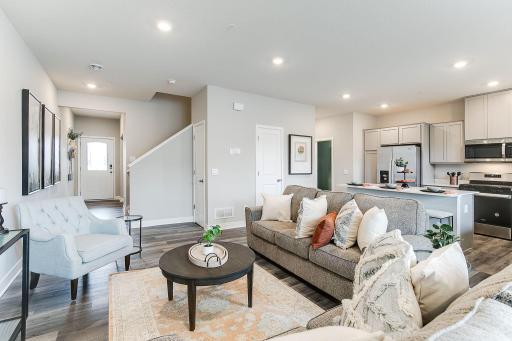 A spacious and bright main area with multiple closets for storage and organization. *Photo is of model home, colors and selections shown may vary.