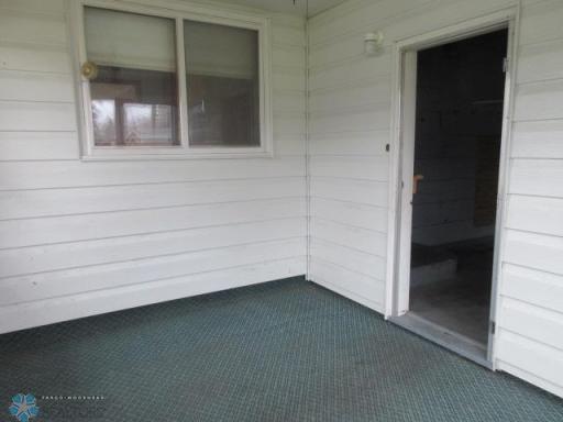Enclosed Porch off back of attached garage