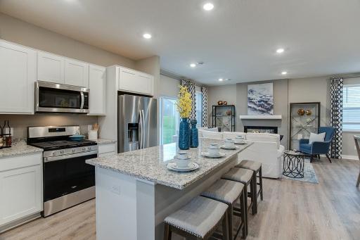 Imagine entertaining in your new kitchen! Model photo. Options and colors may vary.