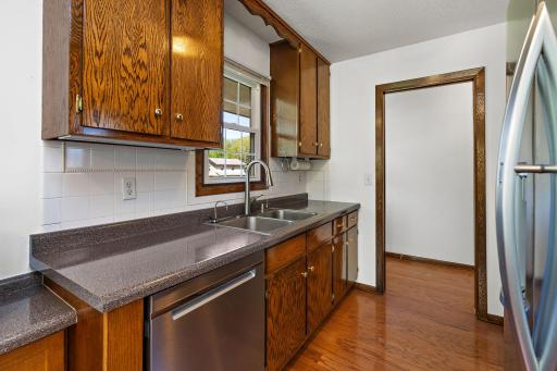 Lots of wood cabinetry, and On-Demand Hot Water Spigot. So nice!