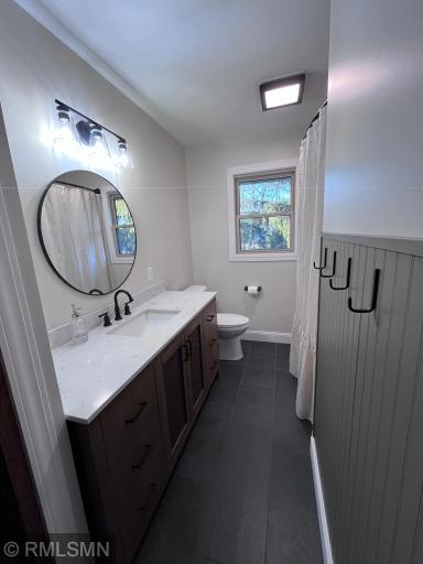 Remodeled bathroom with heated tile floors. You will love them.