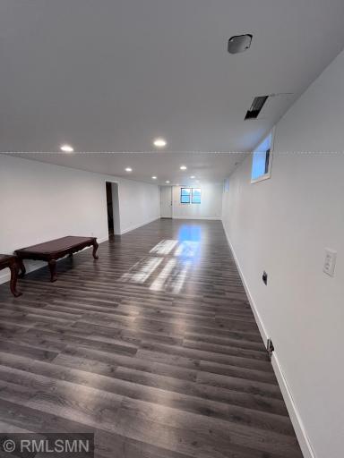 Remodeled family room, LVP flooring. This room is plumbed with water and gas and could easily be set up as a MIL apartment or rental.