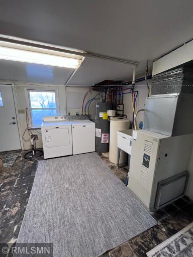 Laundry/utility area with door that lead outside