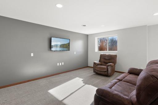 The newly finished lower level is home to a large family room, laundry room, two bedrooms, and a 3/4 bath.