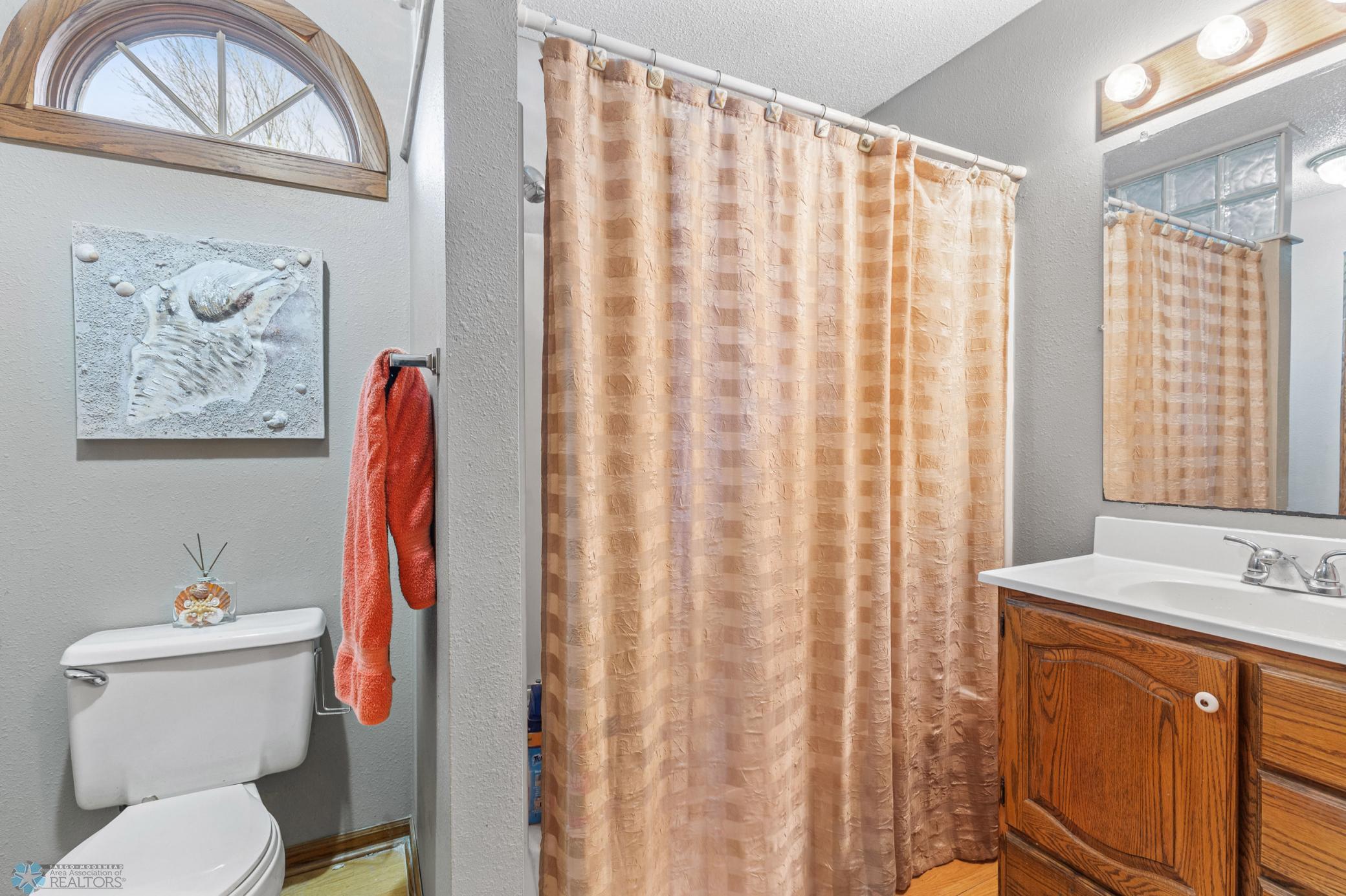 Main Floor full bathroom (also has storage closet - not pictured)