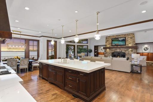 Indulge in stunning lake views while preparing a culinary masterpiece in this beautifully renovated kitchen.