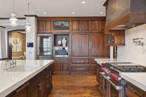Renovated to perfection, this kitchen not only offers top-of-the-line appliances and stylish finishes but also mesmerizing lake views that will elevate your cooking experience.